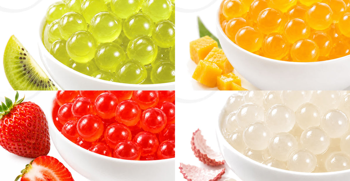Bowls of kiwi, mango, strawberry and lychee popping pearls