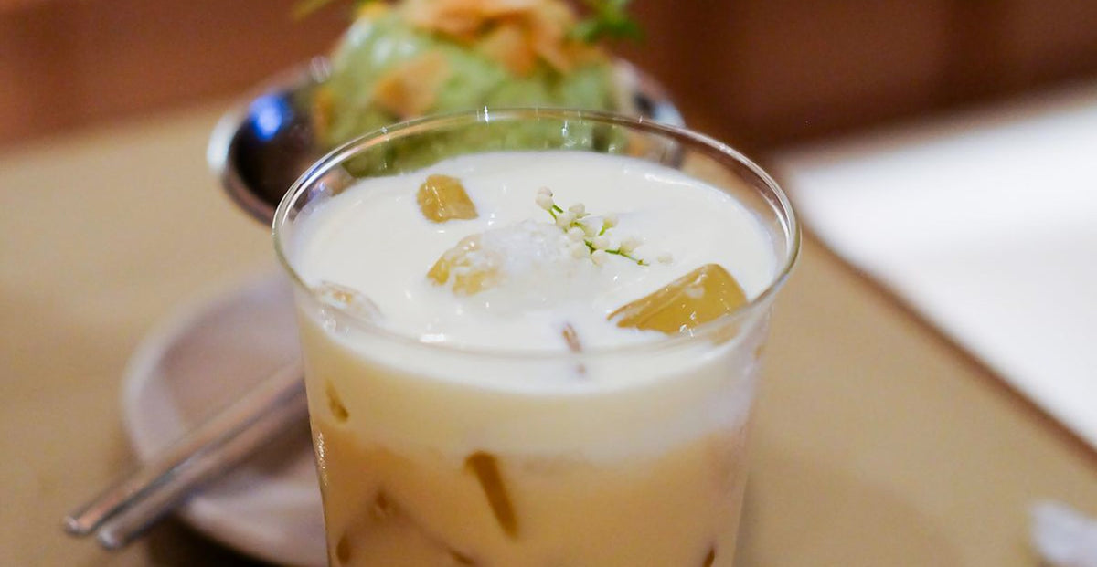A golden iced milk tea layered with cream, similar to a homemade Molly Tea